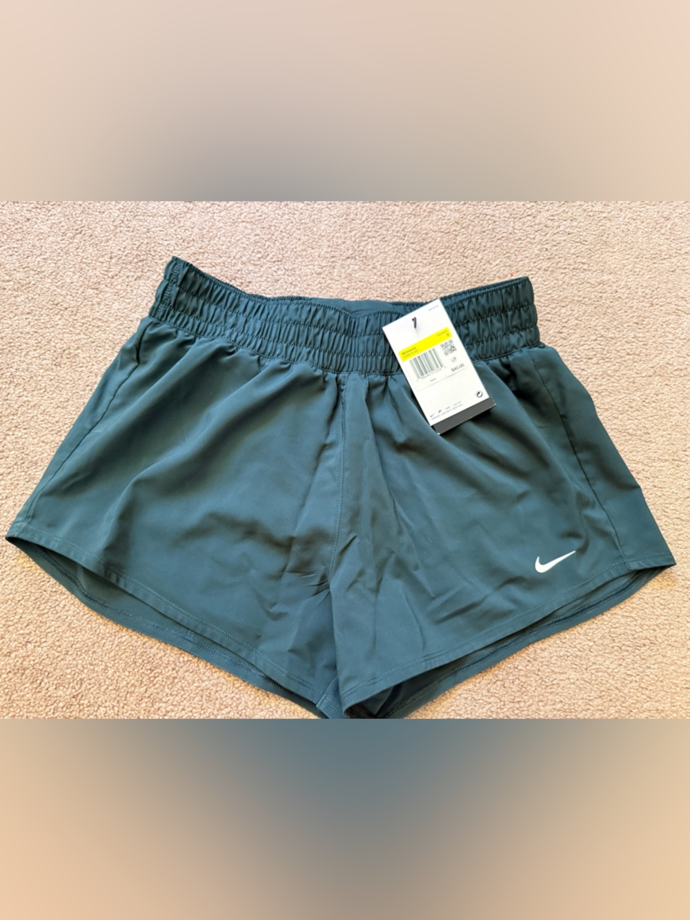 Nike Women's Teal Athletic Shorts with White Swoosh